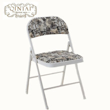 Silla de metal plegable al por mayor con estructura metálica con respaldo de PU y asiento impreso Monroe en muebles plegables en blanco y negro